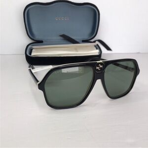 Gucci Black Frame Sunglasses with Green Tint